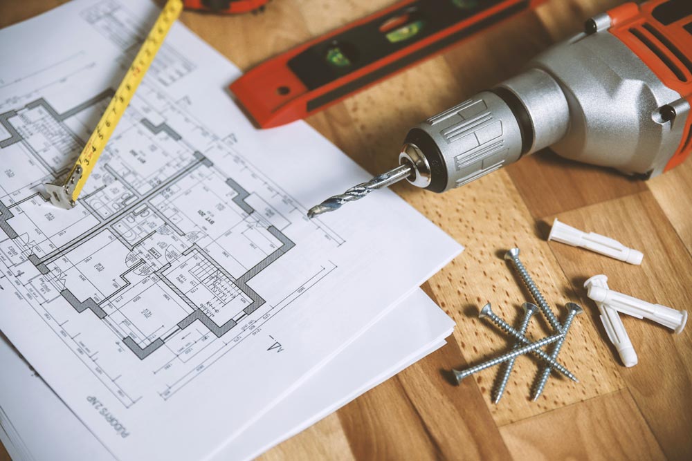 Electric Screwdriver, Screws and Floor Plans — GRT Building Supplies in Port Stephens, NSW